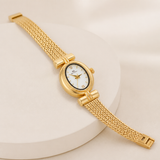 MASO dourado — detalhe da caixa oval e bracelete em malha