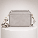 LIA bolsa Cinzenta - vista traseira sobre bloco branco
