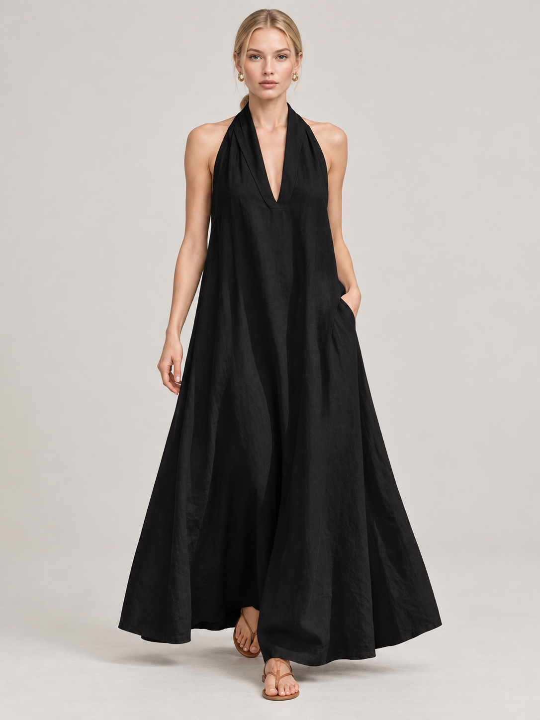 CLARA — preto, com modelo em estúdio