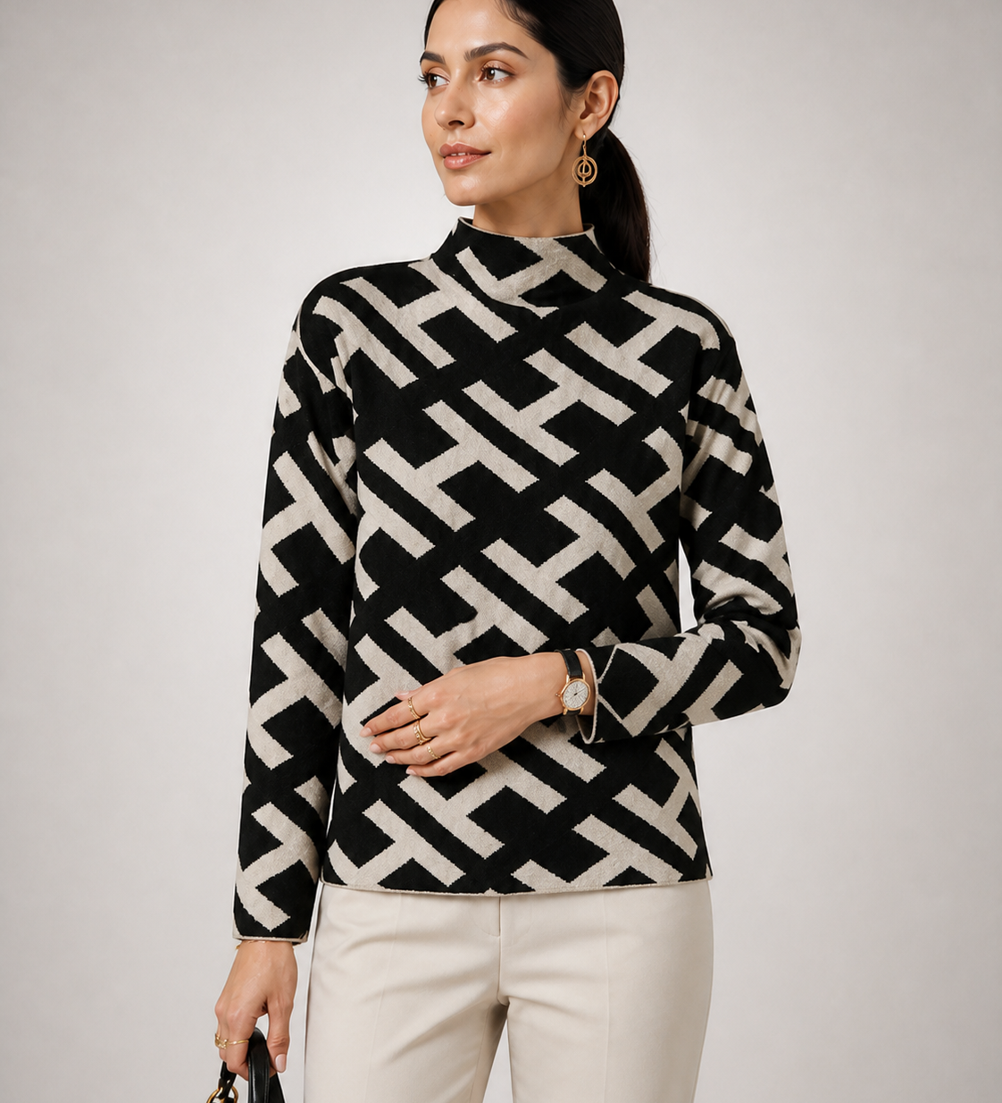 Camisola Daisy preta e marfim — detalhe aproximado