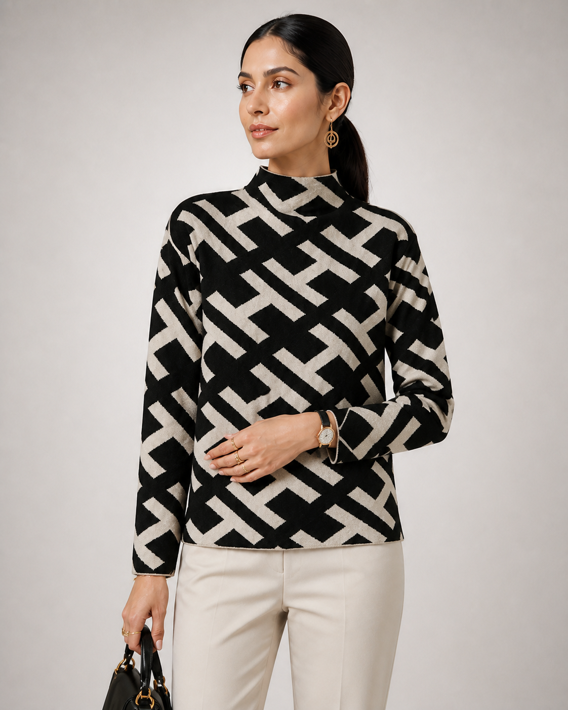 Camisola Daisy preta e marfim — detalhe aproximado