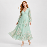 ELGA vestido maxi plissado floral verde-menta - vista em movimento