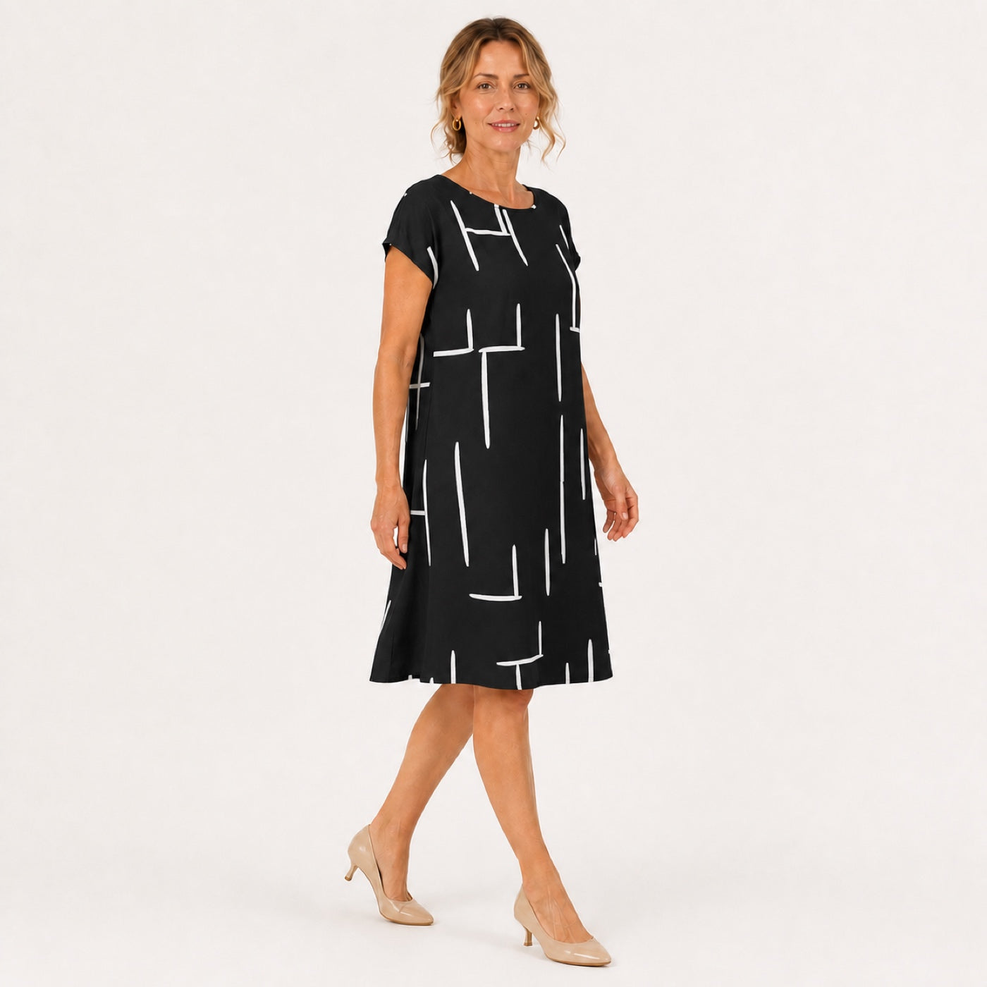 MILOU vestido preto com linhas abstratas — vista lateral