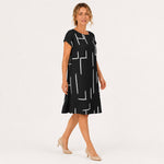 MILOU vestido preto com linhas abstratas — vista lateral